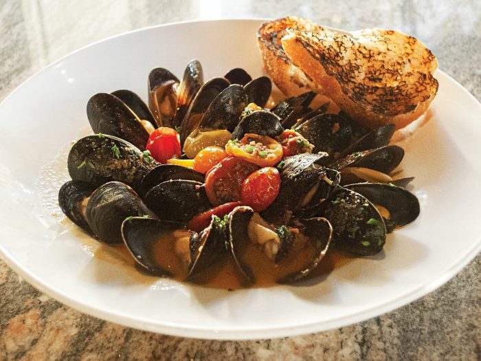 Clams and mussels on a plate from Tutti Mangia, one of the best places to eat drink and shop in Claremont
