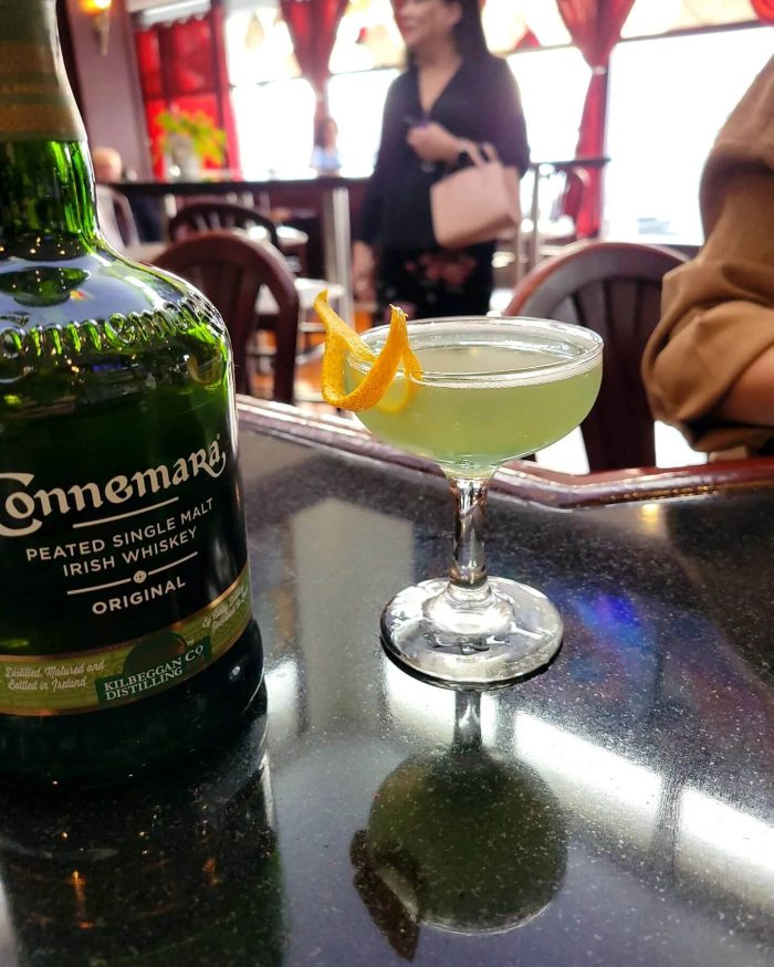Cocktail on a bar with a liqueur, one of the best places to eat drink and shop in Claremont